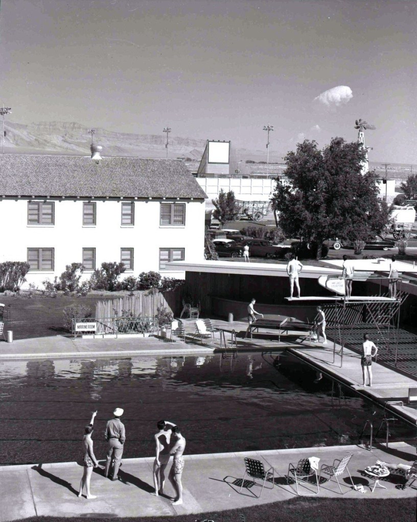 Tourists observe the mushroom cloud from the pool. Photo credit: Citylab/Las Vegas News Bureau