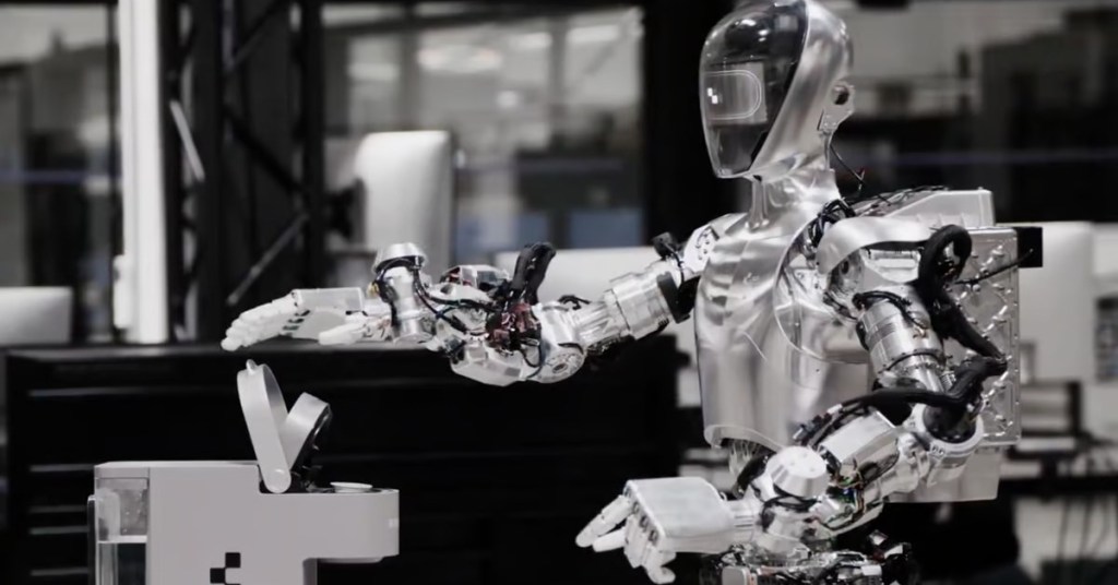 OpenAI usará IA para potenciar robots que ya caminan y hablan 2 robot con inteligencia artificial trabajando